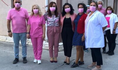 HASTANE PERSONELİ PEMBE MASKE TAKTI
